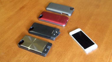 From left to right, the MyCharge Freedom 2000 (in gray and black), the Mophie Juice Pack Air and the Mophie Juice Pack Helium.